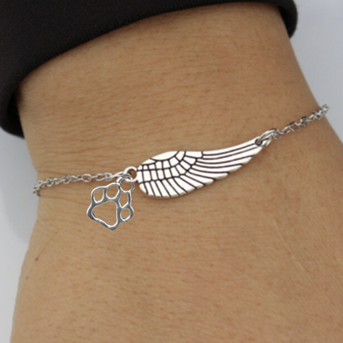 Pulsera Monumento de Plata con Pluma de Ángel y Huella | Hecho a Mano