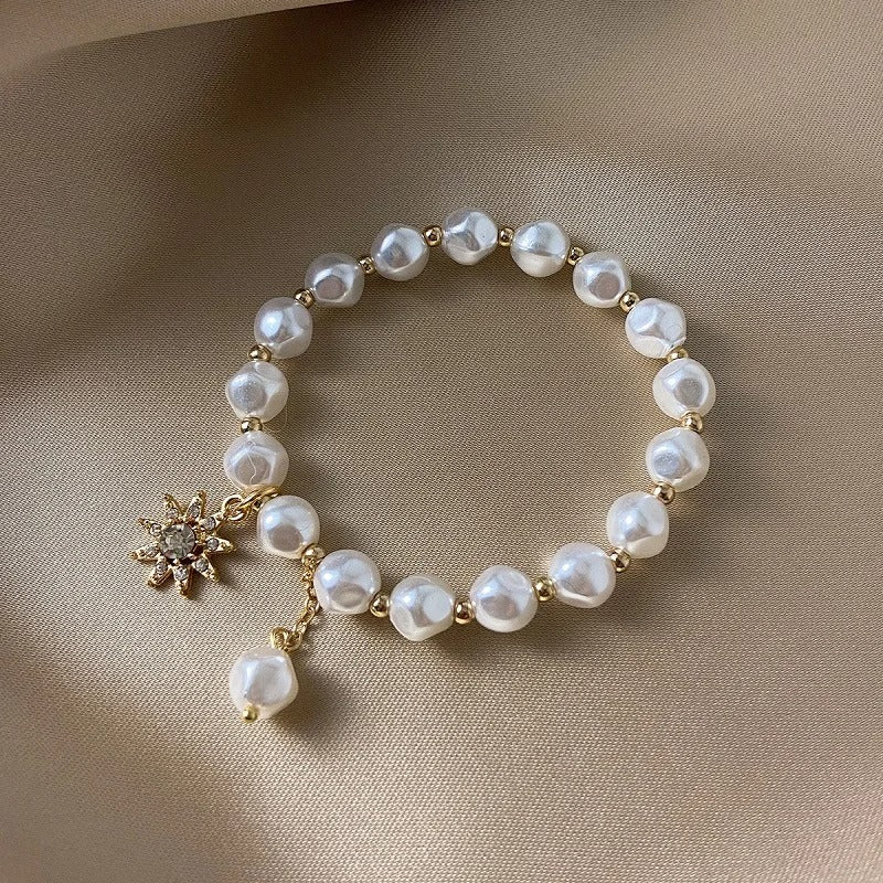 Pulsera con Medallón en Oro Blanco, Margarita y Girasol