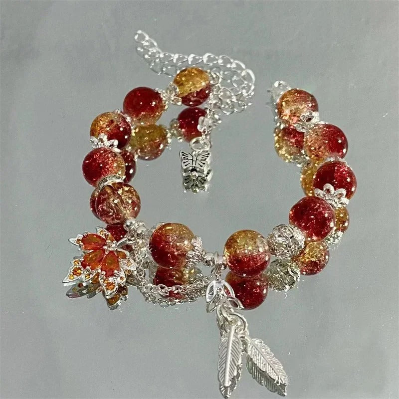 Pulsera con hoja de otoño de plata y mariposa