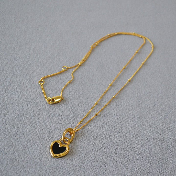 Collar con Colgante Negro y Blanco Corazón en Oro