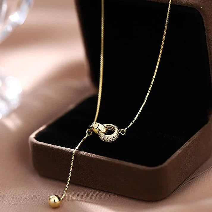 Collar con dos anillos