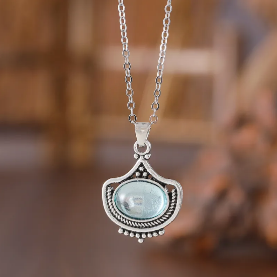 Conjunto retro de collar y pendientes con piedras preciosas ovaladas azules
