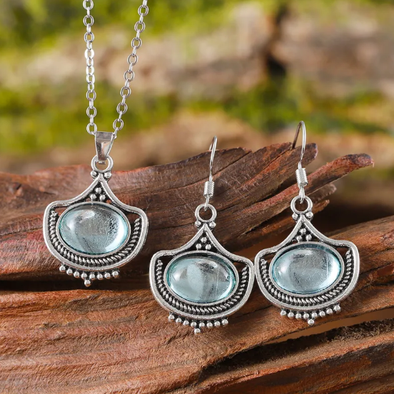 Conjunto retro de collar y pendientes con piedras preciosas ovaladas azules
