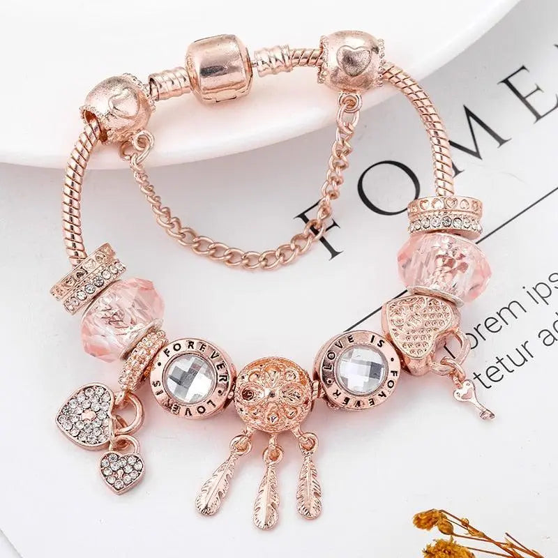 Pulsera Rosa Atrapa Sueños con Colgantes de Plata