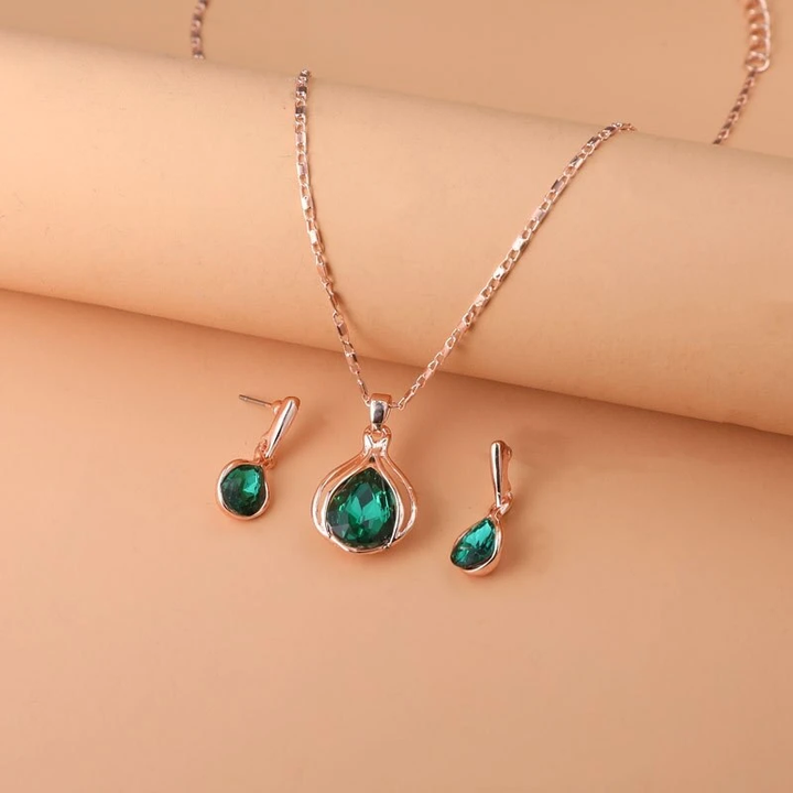 Conjunto de collar y pendientes de cristal verde y oro