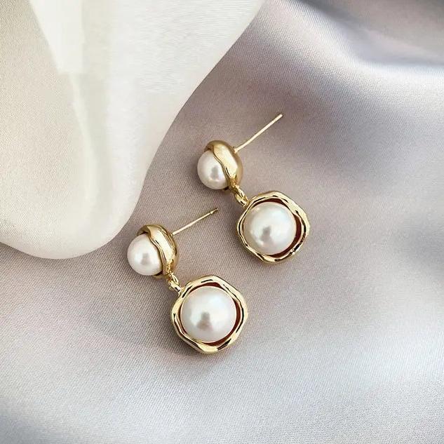 Pendientes con margaritas chapados en oro